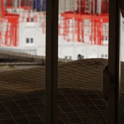 In front of the glass roof